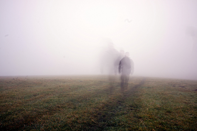 Picture of a person on a moor that looks like a ghost in the fog